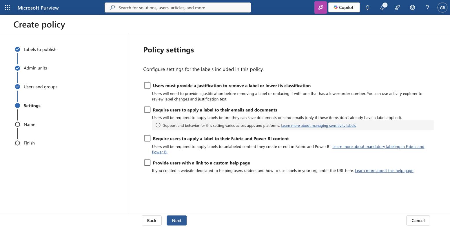 Policy settings for a sensitivity label publishing policy including mandatory labelling and justification options